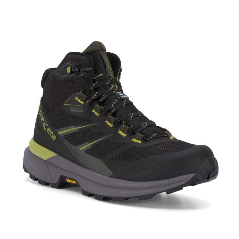 Scarpa da escursione Trezeta Ravik Mid WP uomo, colorazione nero con dettagli oliva e lime, membrana Water Stopper e suola Vibram Orobia, vista 3/4 su fondo bianco